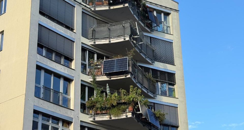 Plug-in solar panels fixed to the balconies of a block of flats